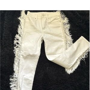 Levi’s white with white fringe on the sides